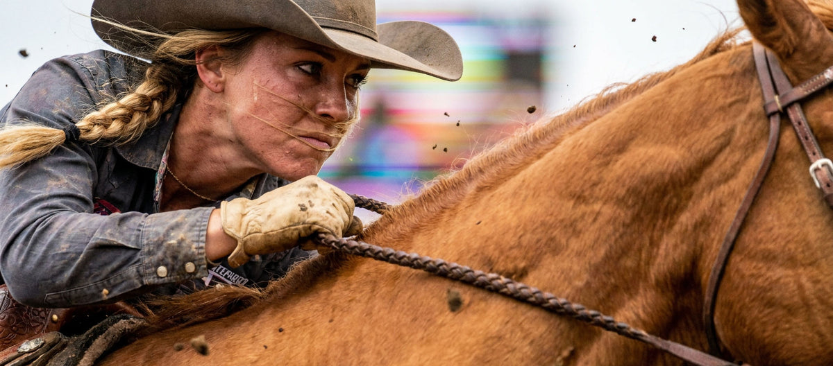 A Western rider and her horse